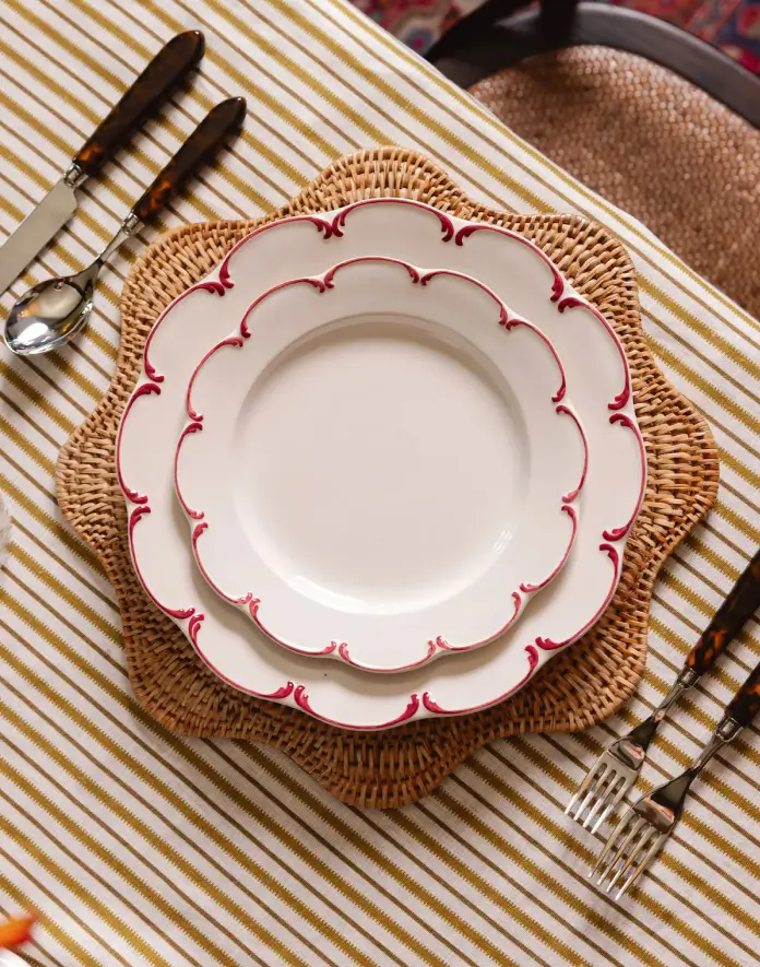 Scalloped rattan placemat